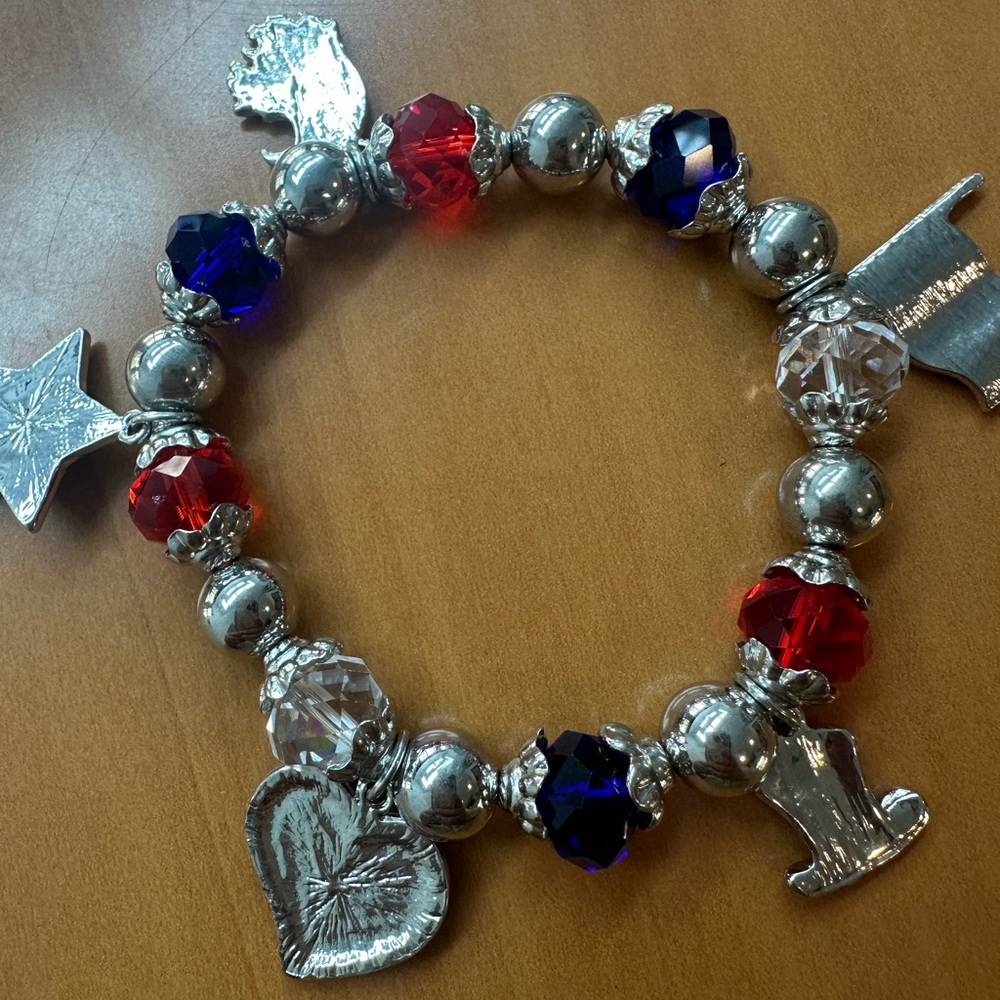 Elegant Silver Charm Bracelet with Red and Blue Accents
